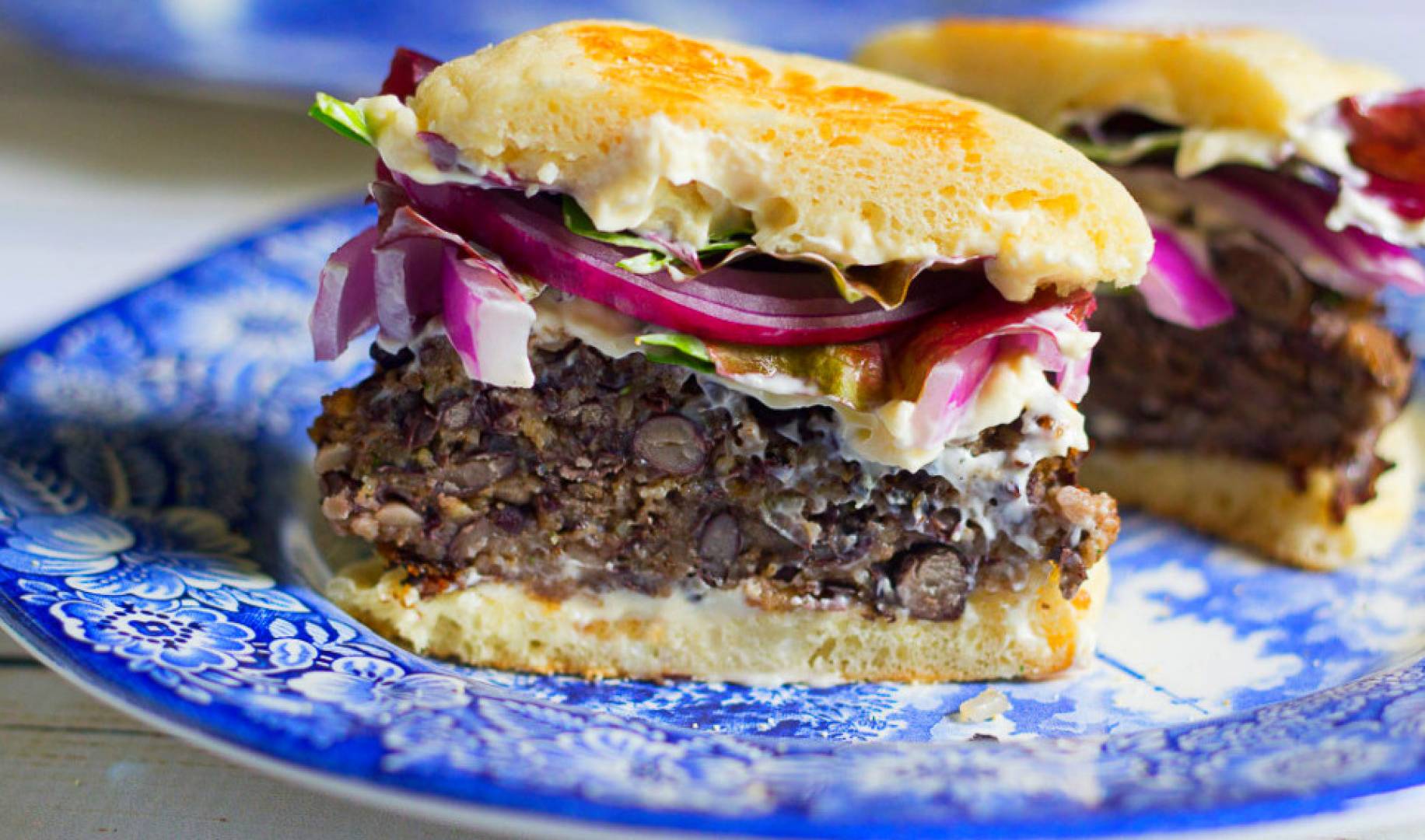 Black Bean Sunflower Butter Burger with Garlic Chili Sauce and gluten free bread