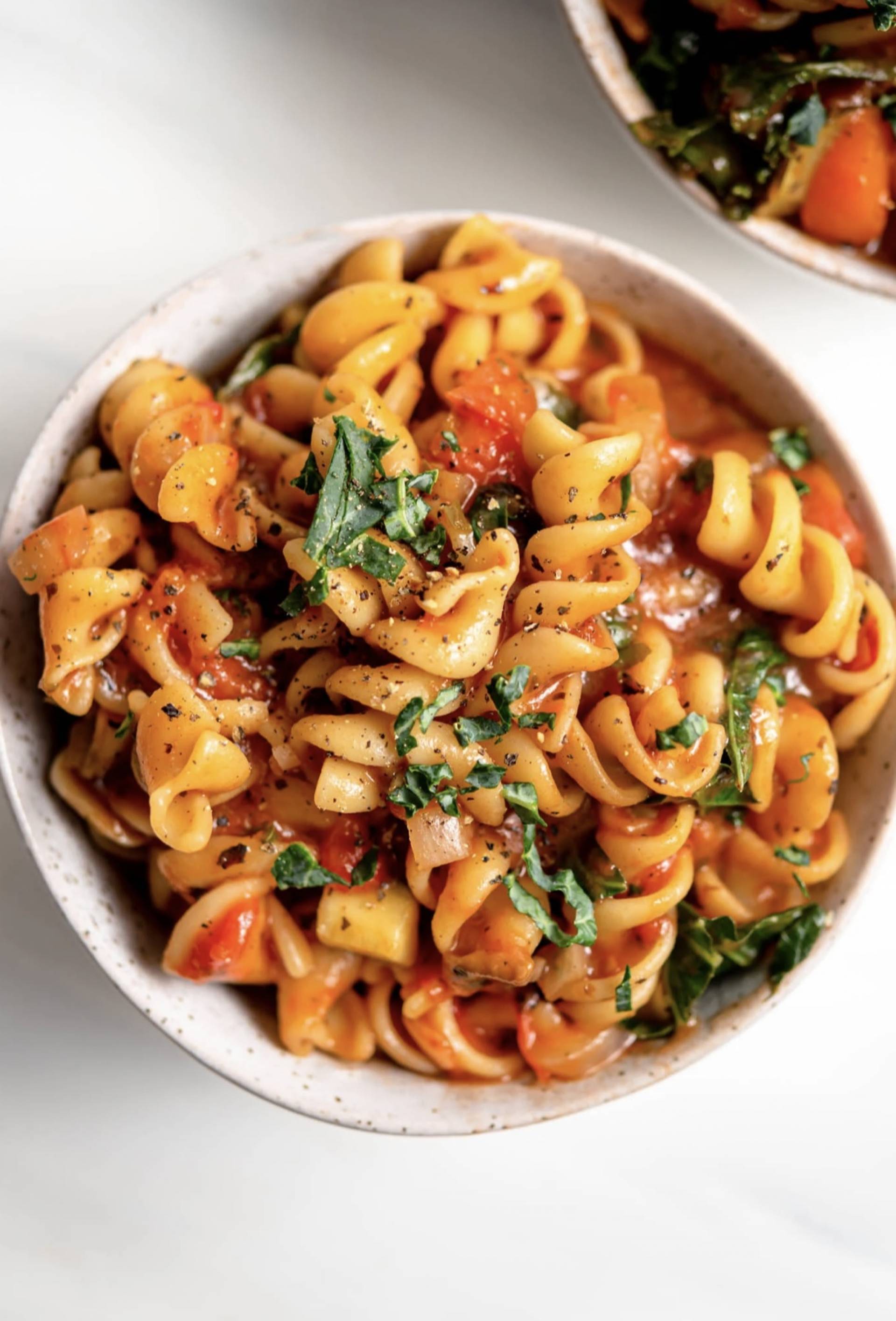 Roasted Tomato, Garlic, and Kale Creamy Pasta with local Beef